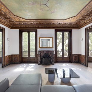 Renovación de apartamento histórico del siglo XI en el Barrio Gótico de Barcelona con muros de piedra medievales conservados y modernas instalaciones de lujo